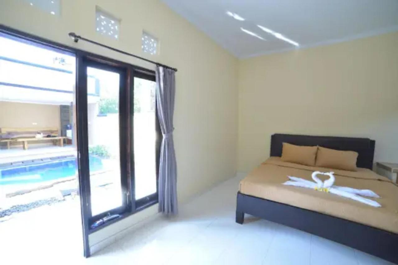 Oyo Flagship 91237 Ratu Guest House Kedunganan Exterior foto