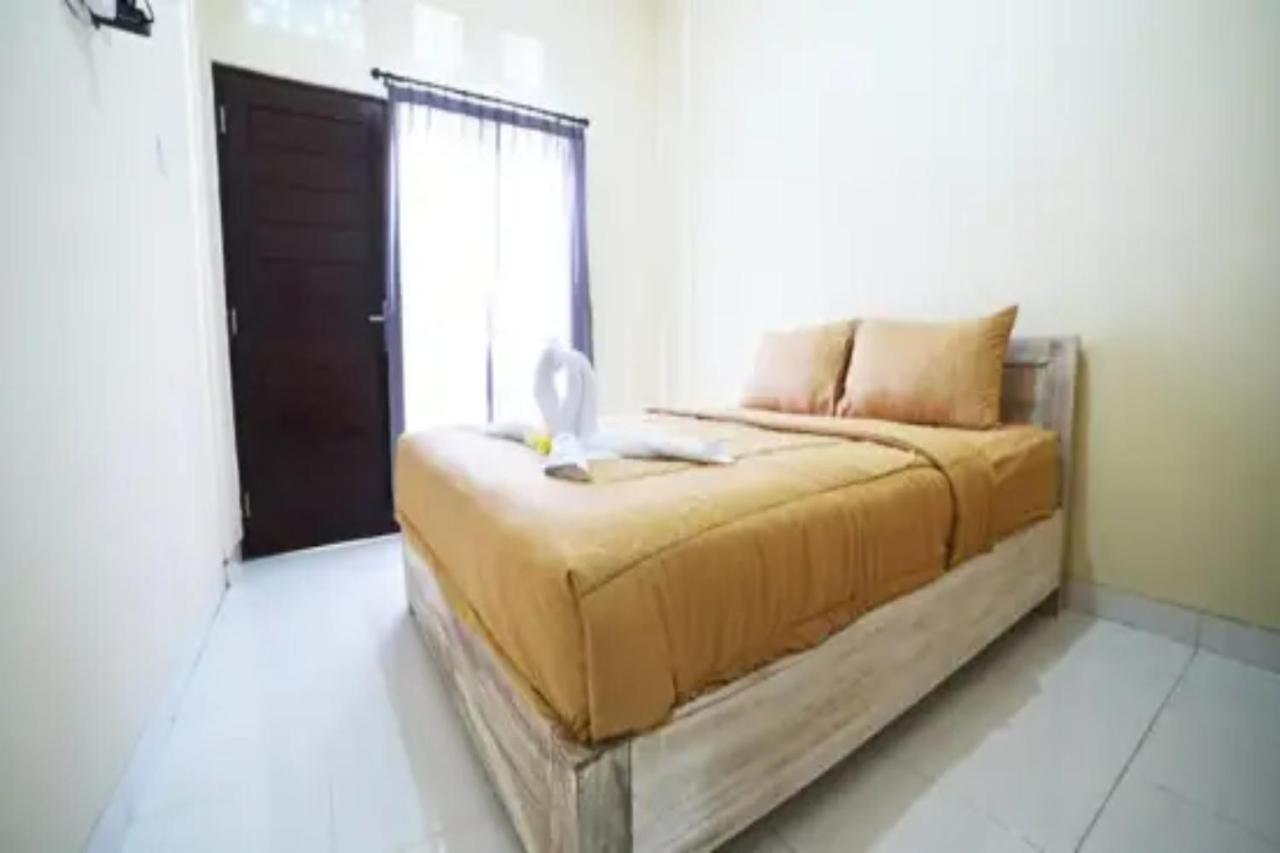 Oyo Flagship 91237 Ratu Guest House Kedunganan Exterior foto